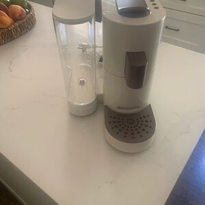 Modern White Coffee Machine with Bronze Details